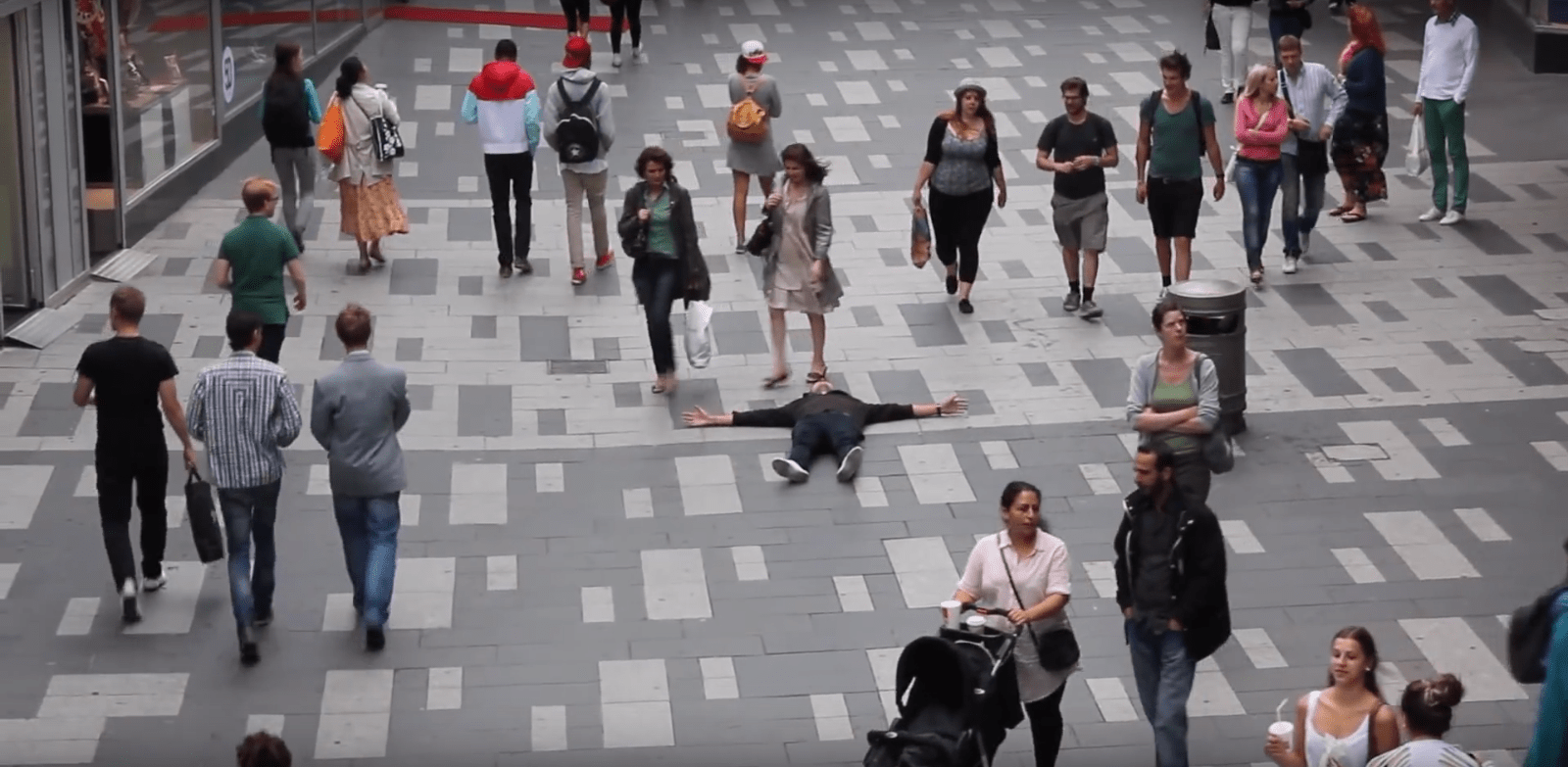 laying down in a busy street