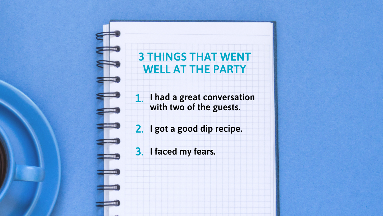 A notepad next to a cup of coffee reads, "3 things that went well at the party: 1. I had a great conversation with two of the guests. 2. I got a good dip recipe. 3. I faced my fears."
