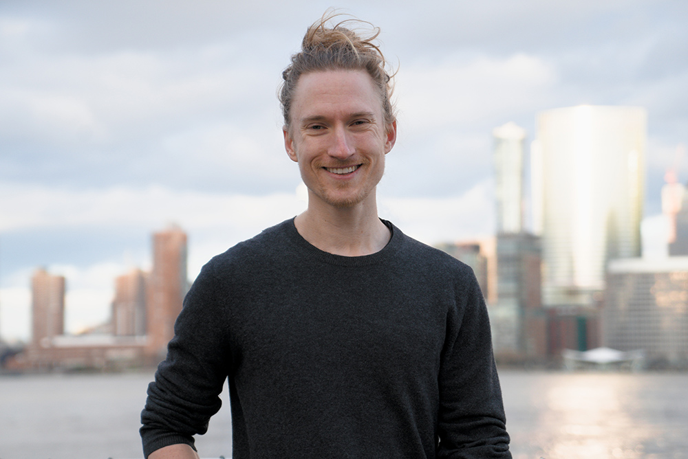 David Morin with the New York City skyline in the background