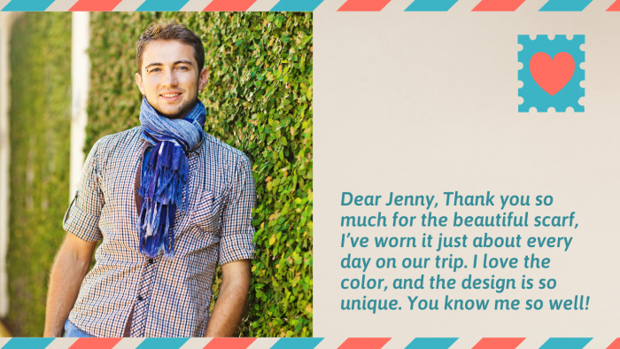 A postcard with a person using a scarf he received as a gift from a friend. The message says how much he enjoyed the scarf. 