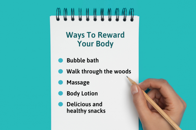 Bullet points on ways to reward your body on a wired notebook, and a hand writing with a pencil on it. 