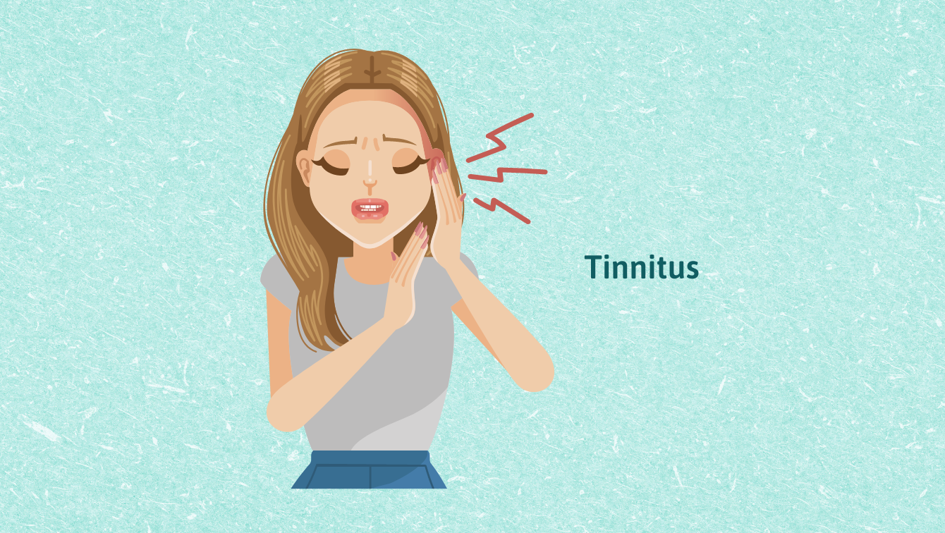 A person holding their ear in pain, suffering from Tinnitus.